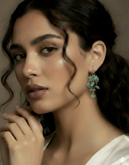 14k gold plated earring with green parade!!