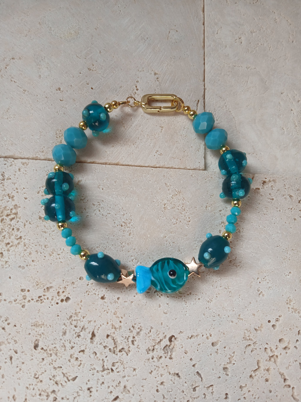 "Ocean Glimmers in Murano Glass"